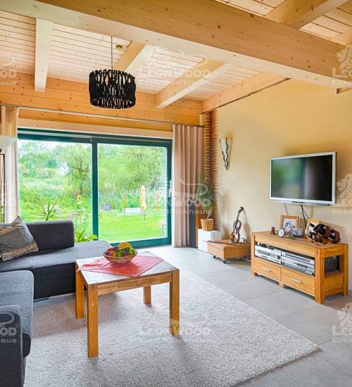 Leonwood_Blockhaus_Alpina-One_1713HH_07_Wohnzimmer_rgb